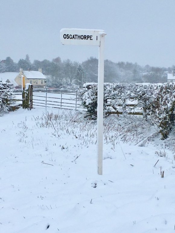 Osgathorpe sign post in the snow